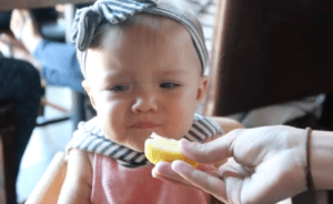 "Baby eats lemon for the first time"