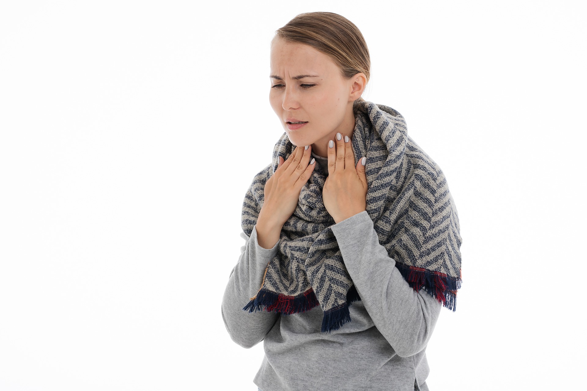 Sharp pain in the throat when swallowing on one side